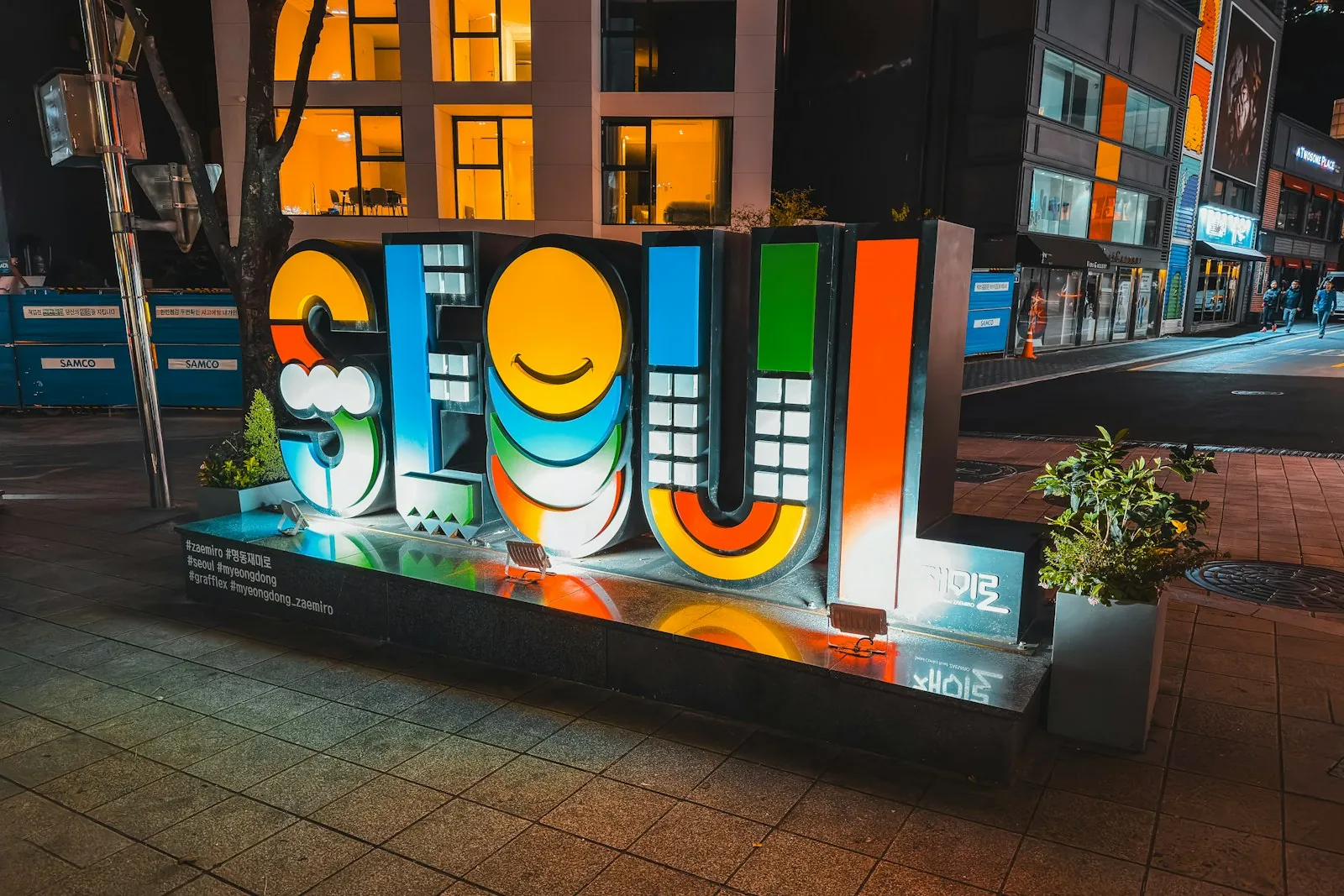 Colorful Seoul landmark sign at night, illustrating getting a Korea eSIM and a Korean phone number as a foreigner