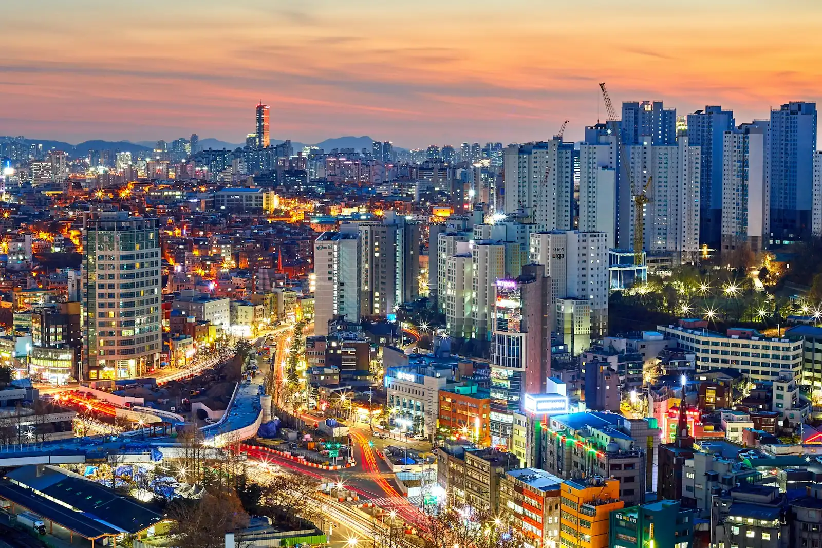 Seoul skyline at sunset with N Seoul Tower, illustrating the Korea prepaid to postpaid ARC bridge for foreigners