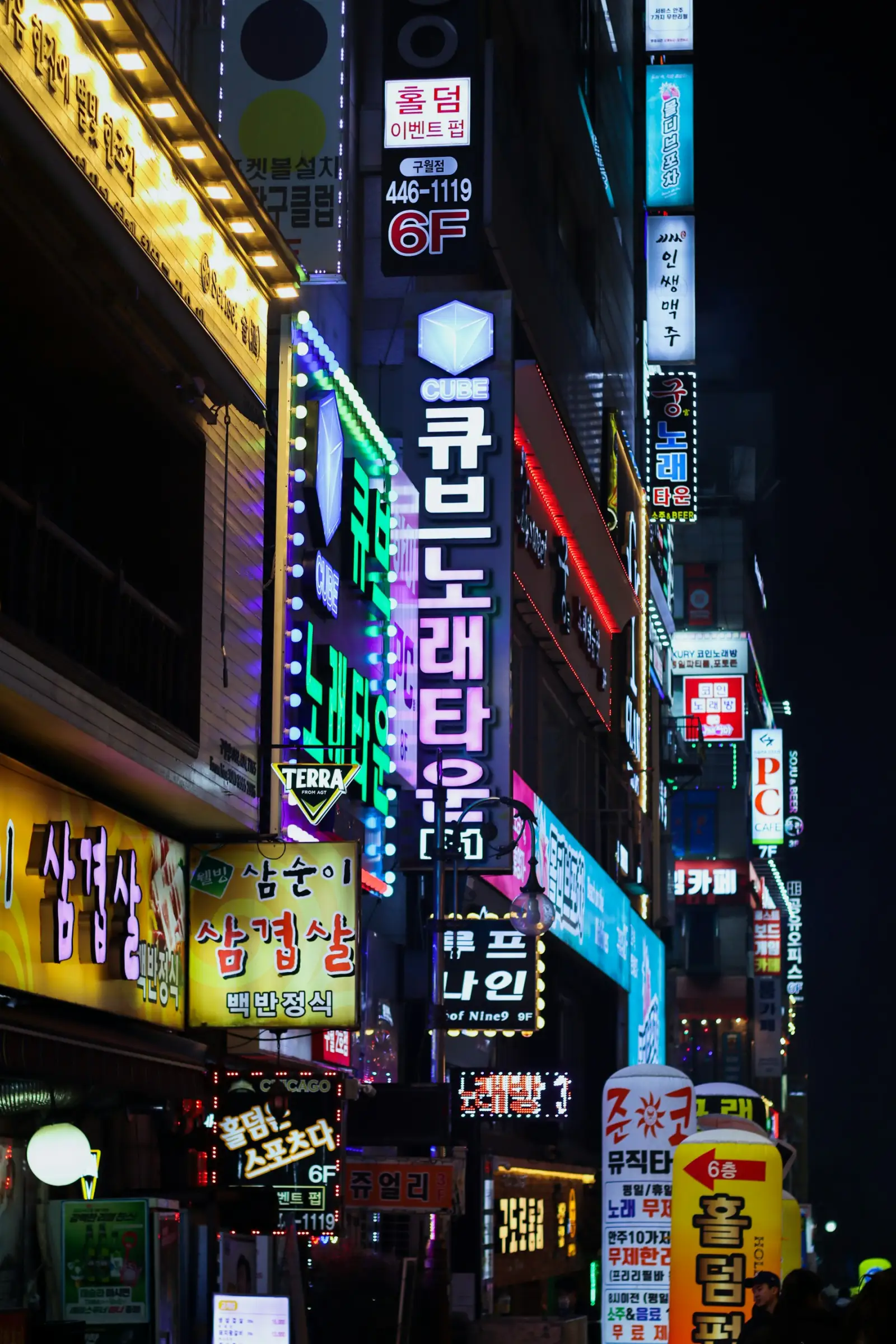 Neon signs on a Seoul street at night